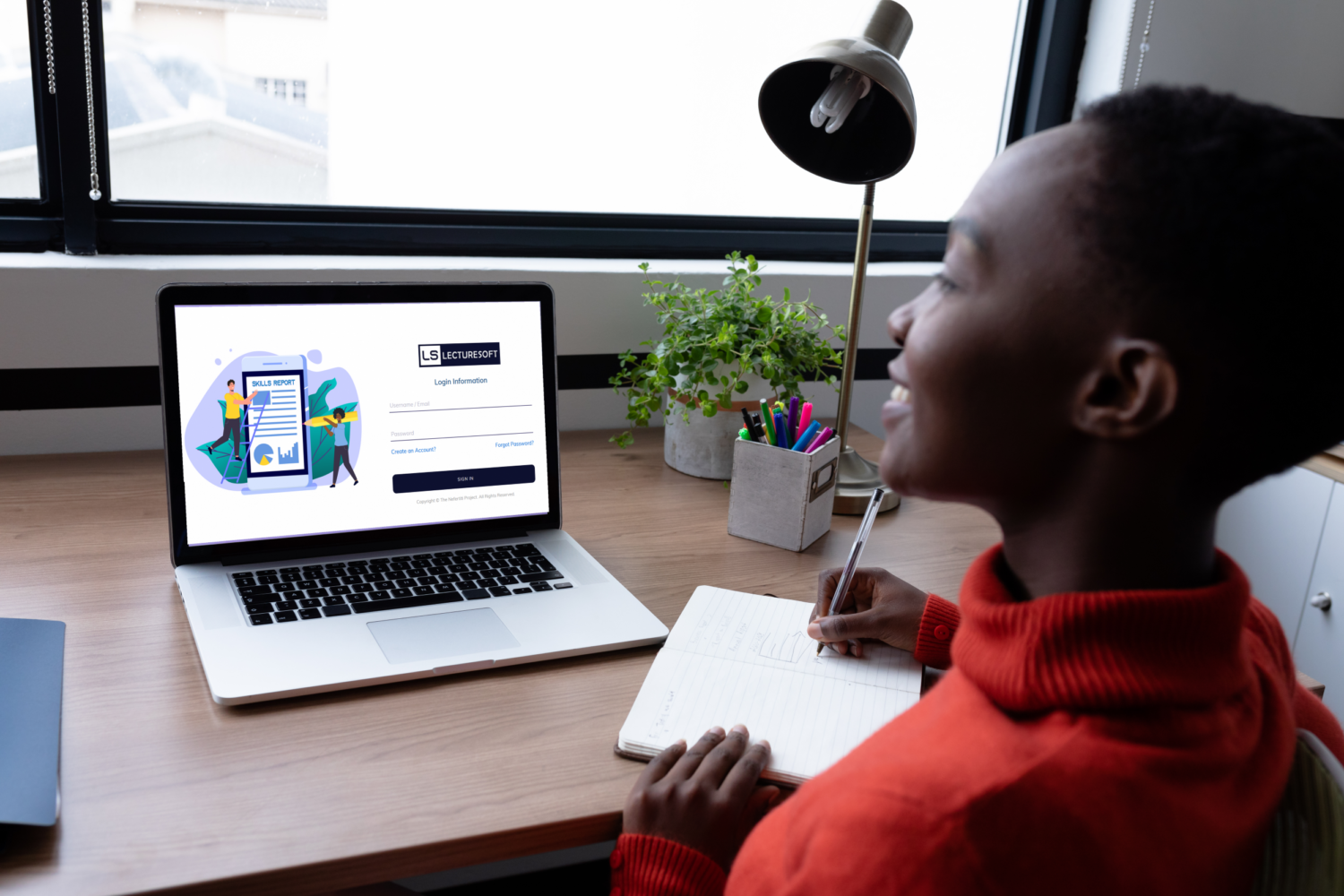 happy-african-american-businesswoman-having-video_OPT Woman on laptop with Lecturesoft login